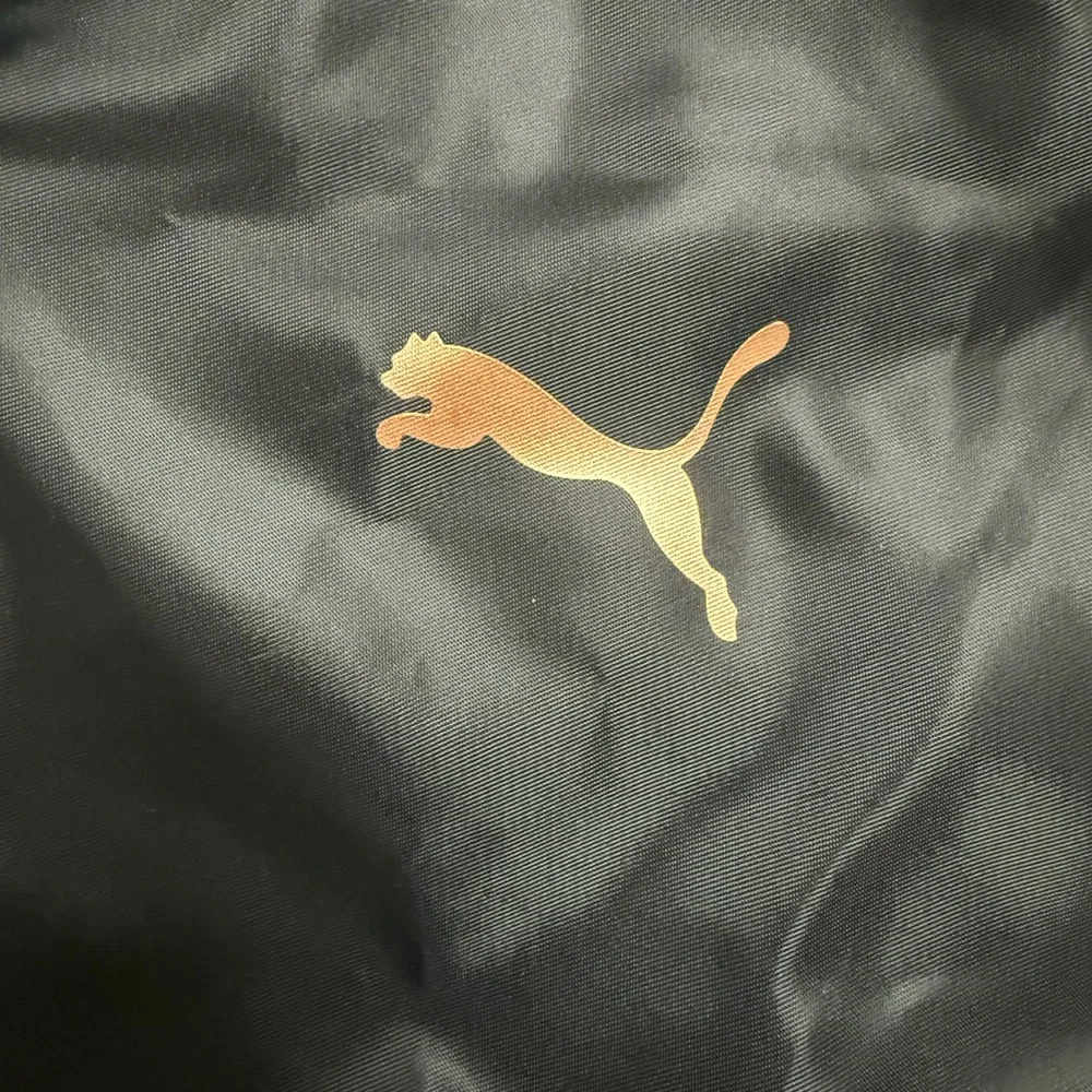 Puma Black Duffel Bag with Gold Logo